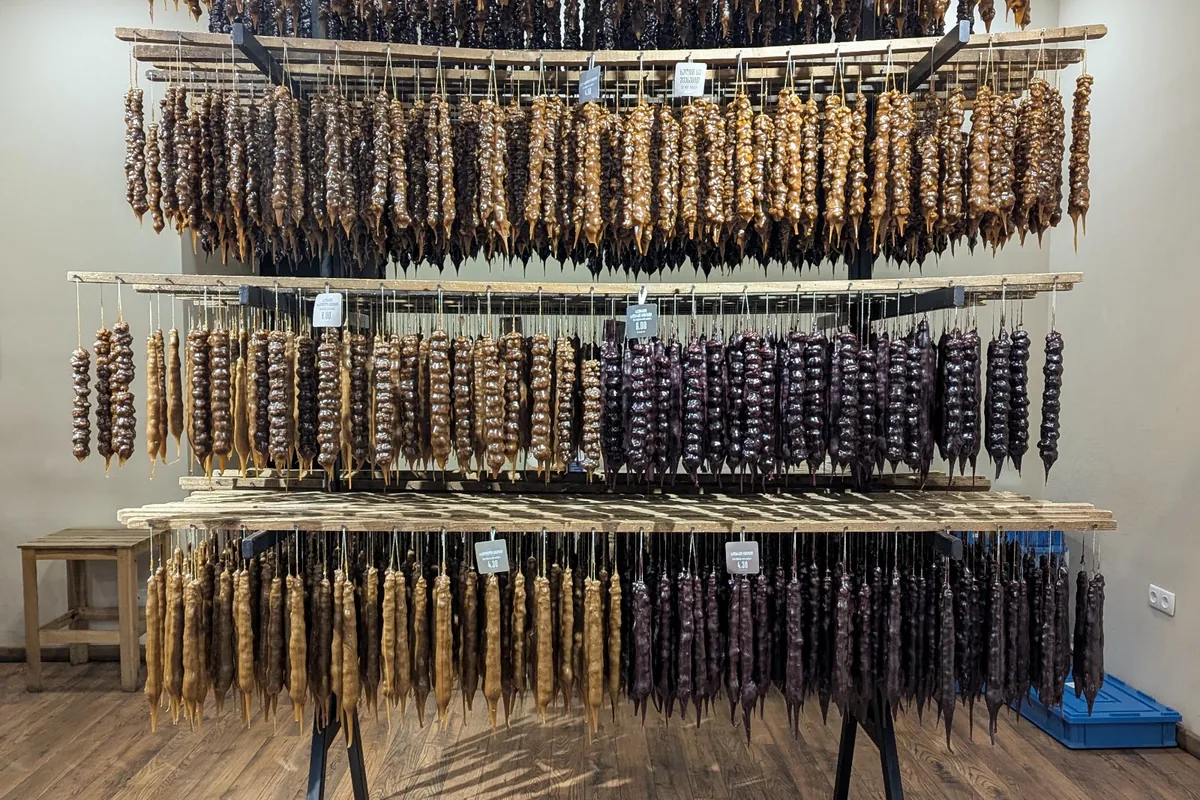 Racks of churchkhela hanging inside the Badagi shop