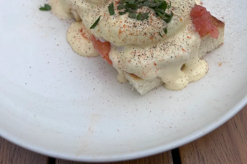 Eggs benedict with smoked salmon on toasted bread at The Blue Fox Restaurant