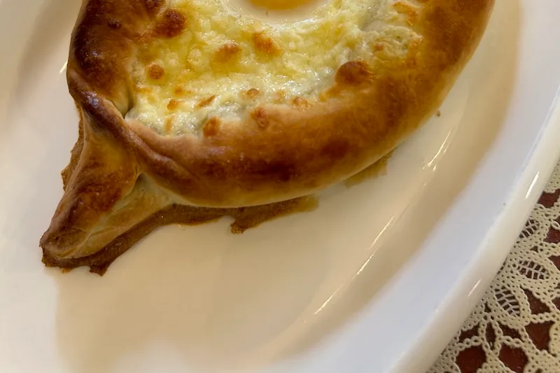 Adjarian khachapuri with egg and butter at Chakandrila Cooking Classes