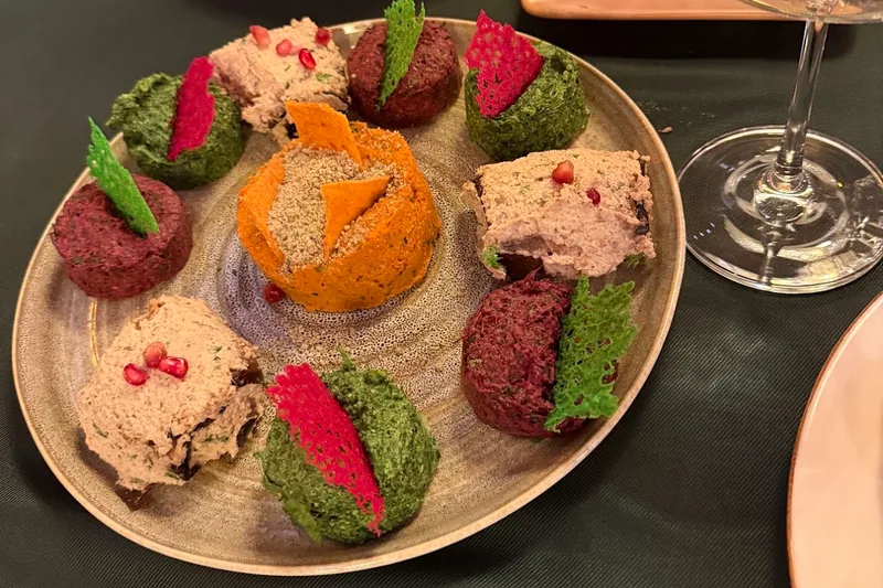 Assorted pkhali platter with walnut rolls at Ethnographer restaurant