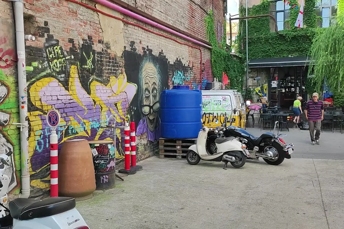 Graffiti-covered courtyard at Fabrika on Ninoshvili Street