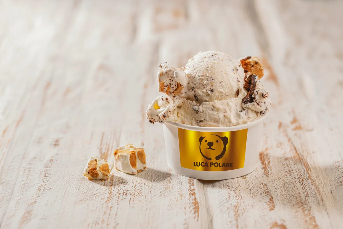 Ice cream cup with nougat pieces at Luca Polare