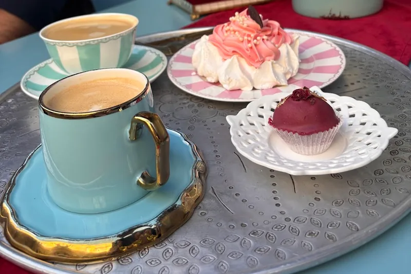 Coffee and pastries on a metal tray at Matasse1822