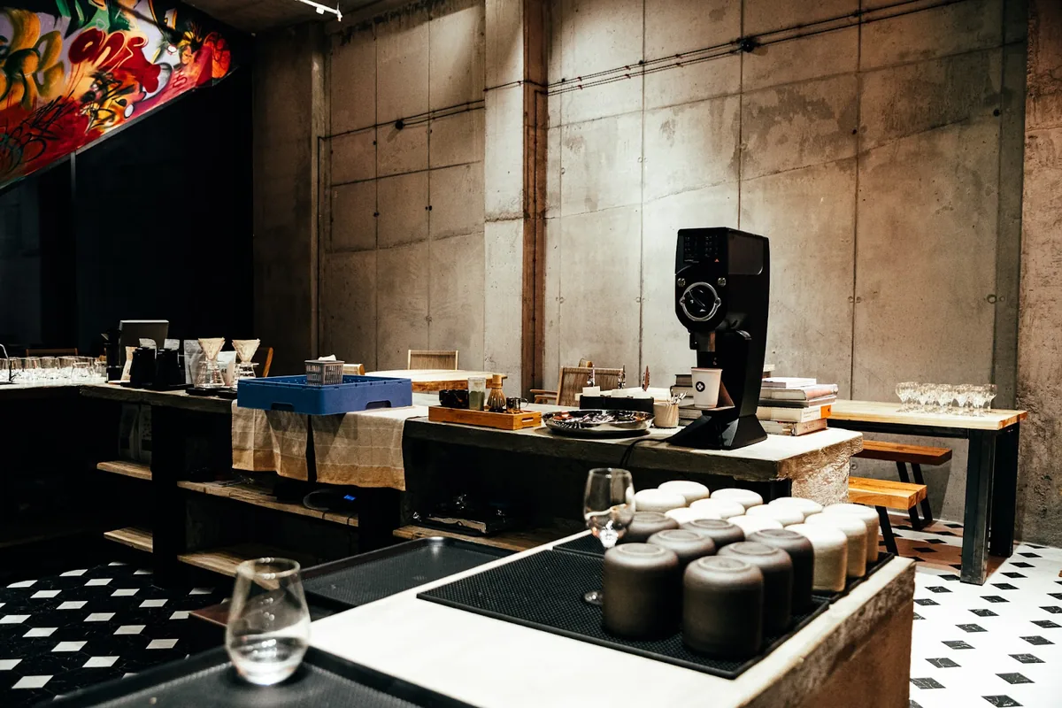 Coffee bar and concrete walls at OKRO Coffee Roastery