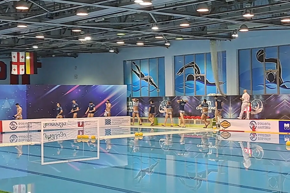 Competition pool with water polo goals at the Olympic Complex in Isani