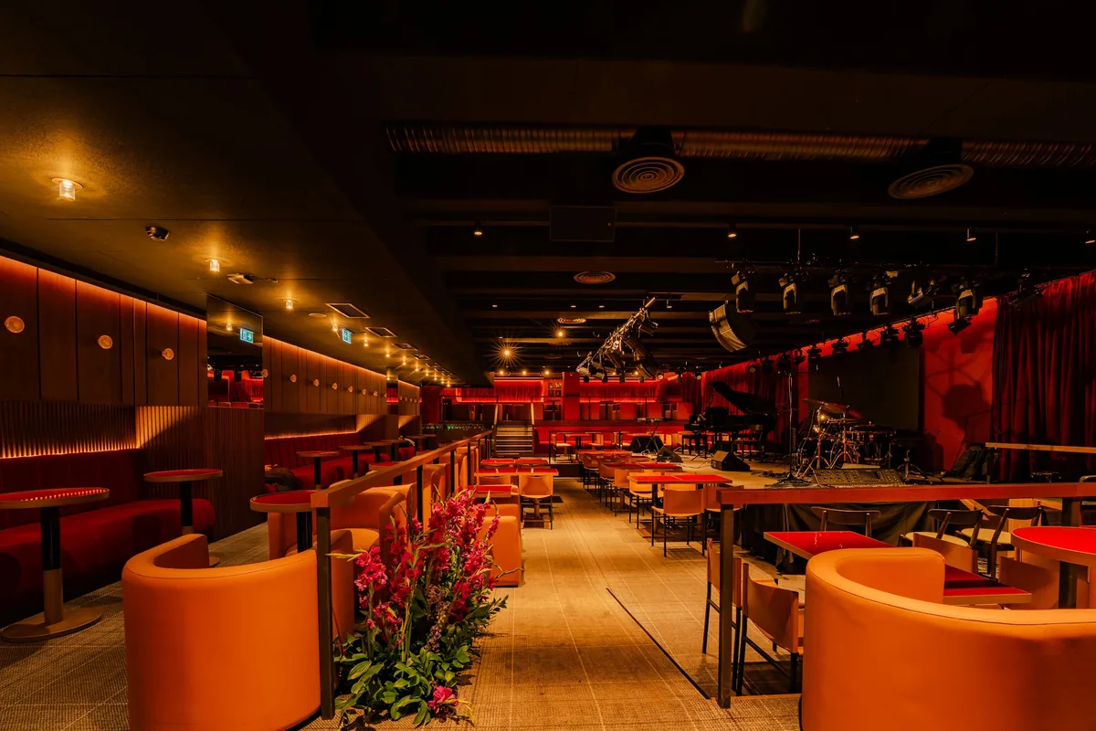 Jazz club seating area and stage at Tatuza Jazz Club