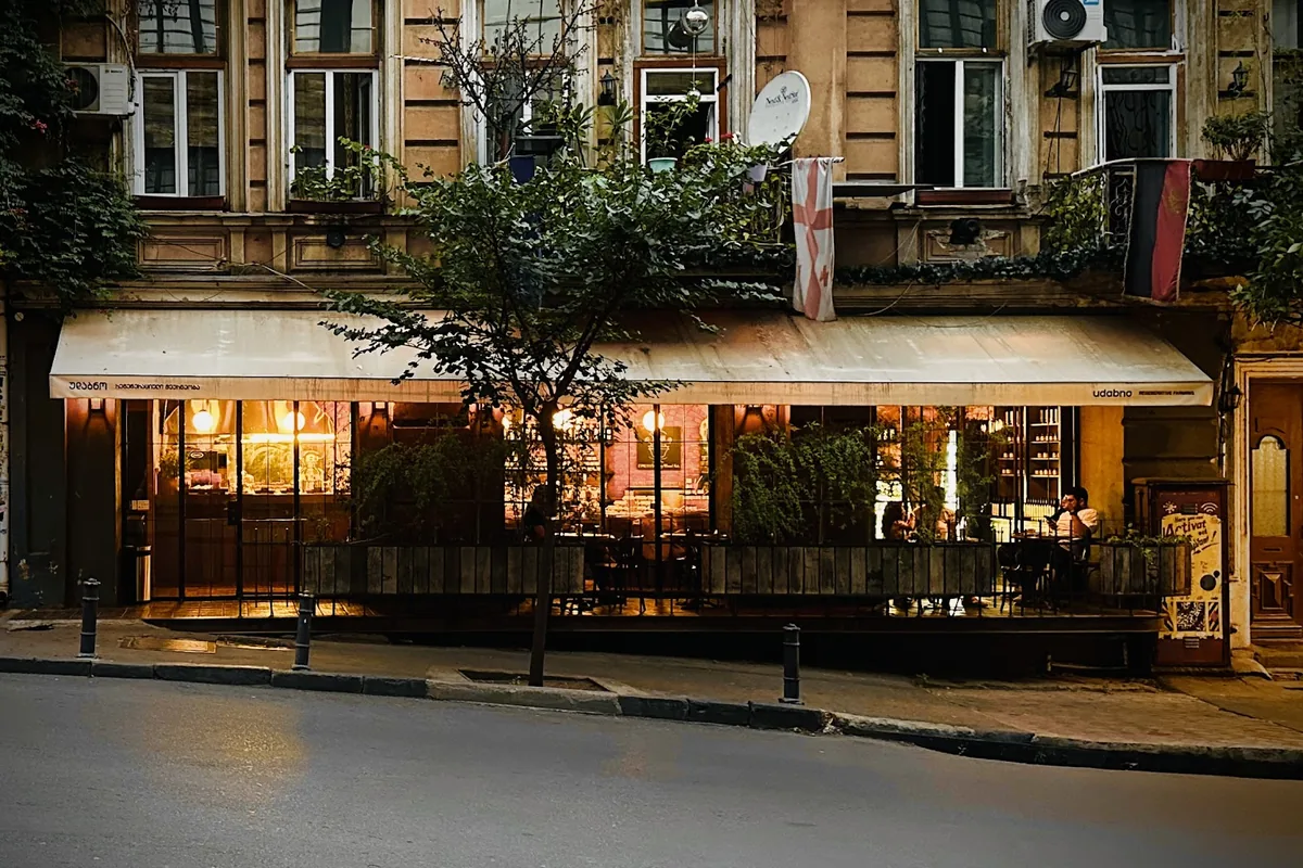 The Udabno shop front in Vera at night