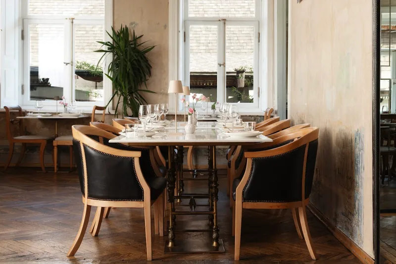 Dining room with painted ceiling and herringbone parquet floor at Unfound Door