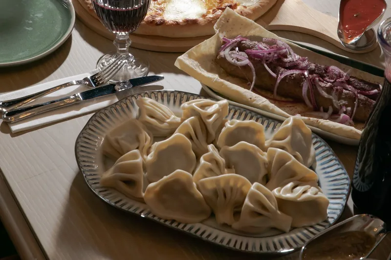 Georgian feast with khinkali, imeruli khachapuri, and kebab at Vakhtanguri