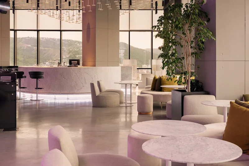 Lounge with disco balls and a mountain view at the Weather Report Sky Bar