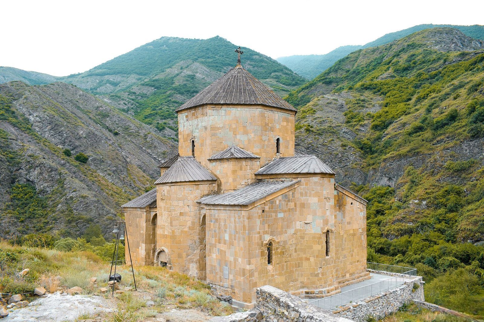 Ateni Sioni, a 7th-century stone church with a conical dome, in the green valley south of Gori