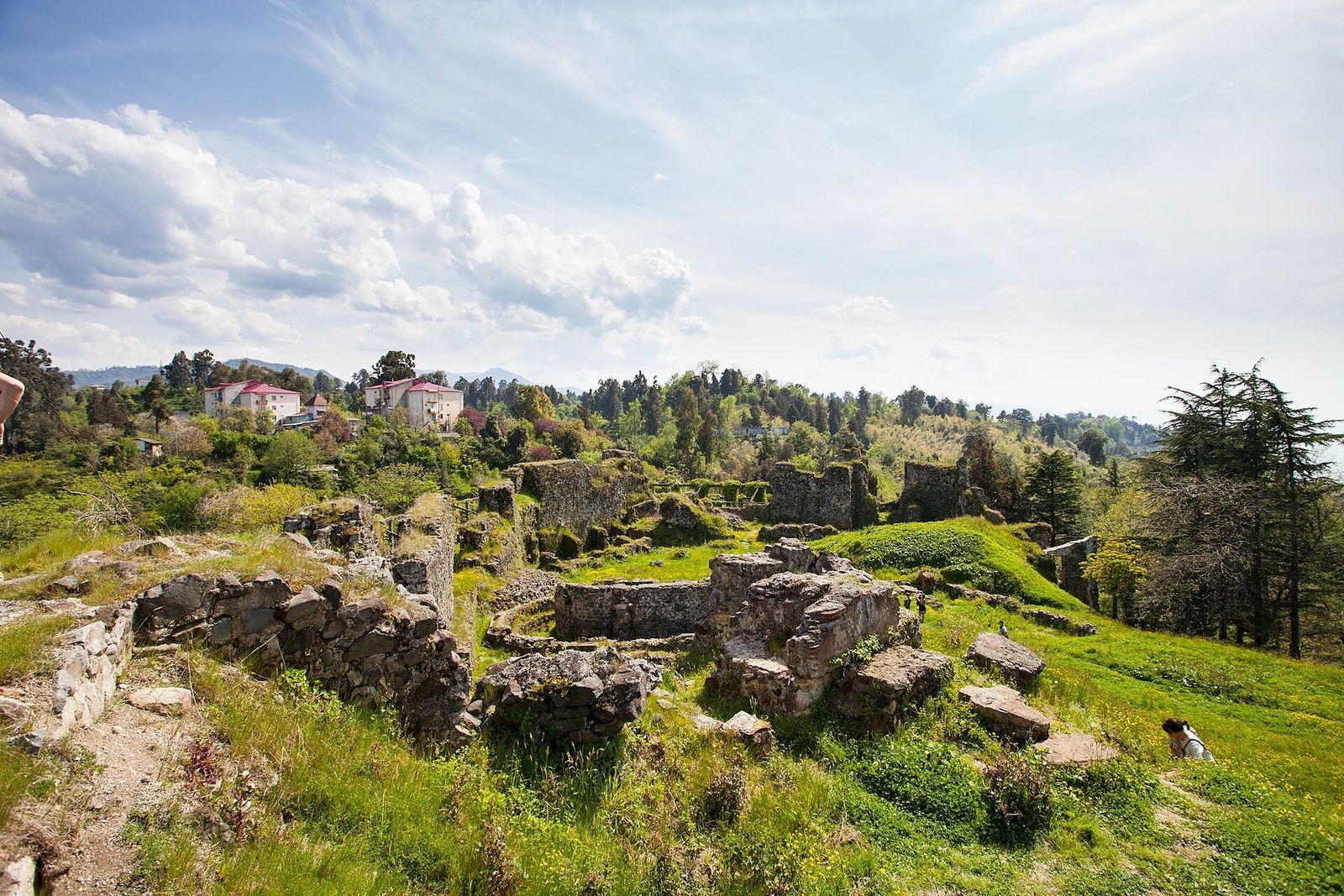 The grassy stone ruins of Petra Fortress on the Adjara coast at Tsikhisdziri