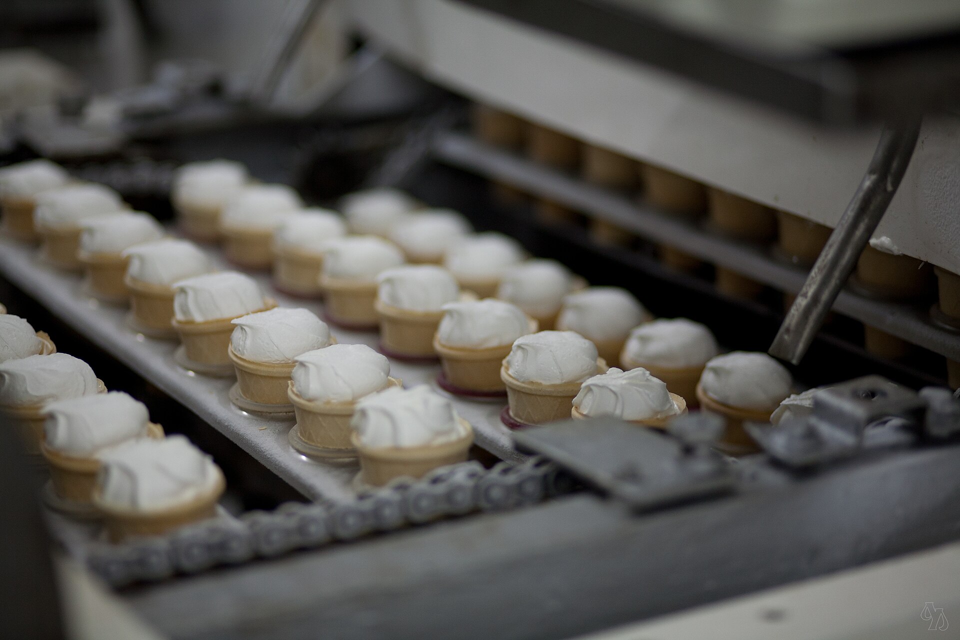 Vanilla plombir in waffle cups on a Soviet-era production line at an ice cream factory