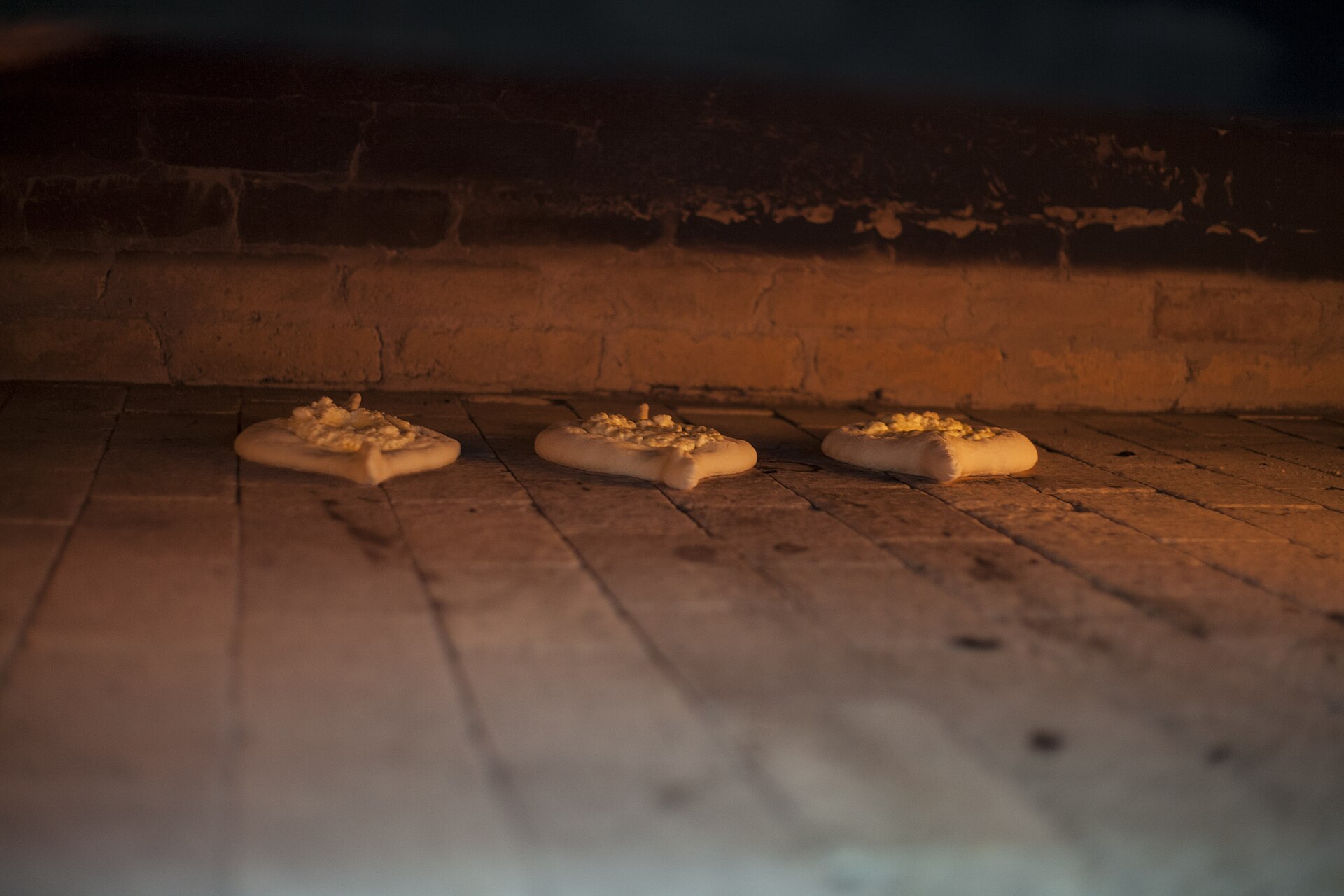 Adjaruli khachapuri, the boat-shaped Georgian cheese bread with egg and butter
