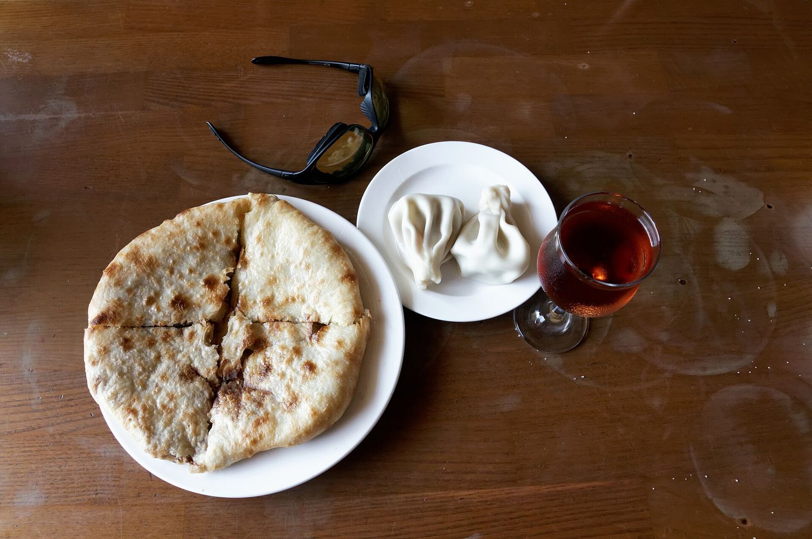 Khachapuri and khinkali. Georgian traditional food. Tbilisi, Georgia.