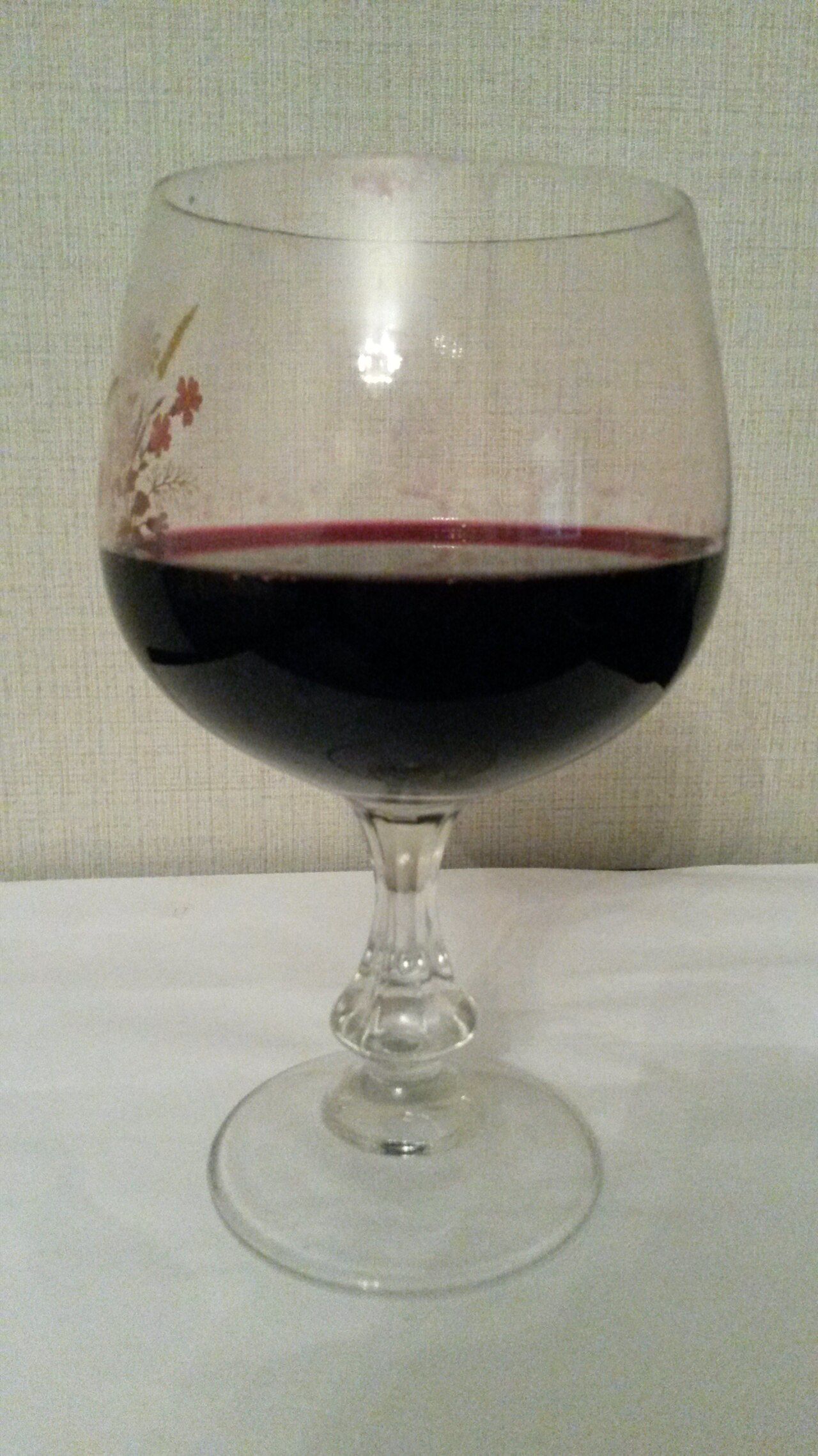 A glass of Saperavi, Georgia's dark red wine