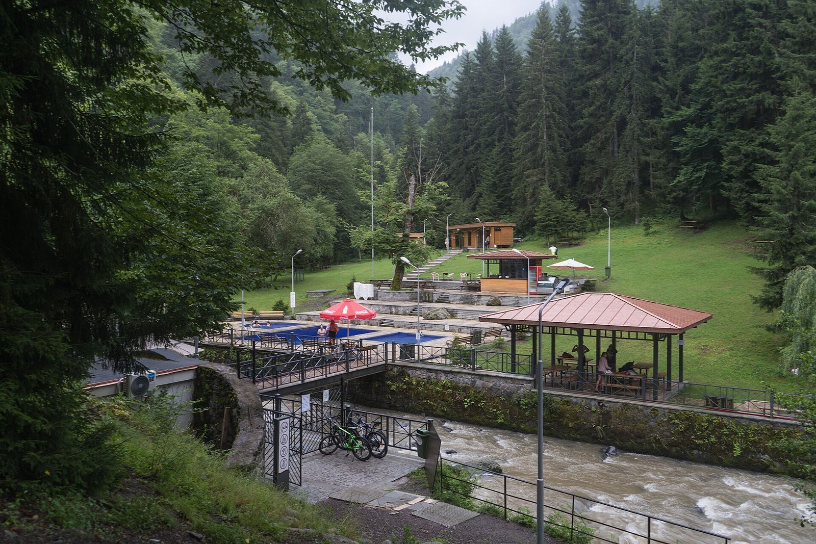 The open-air sulfur pools in the forest at Borjomi, beside a mountain stream