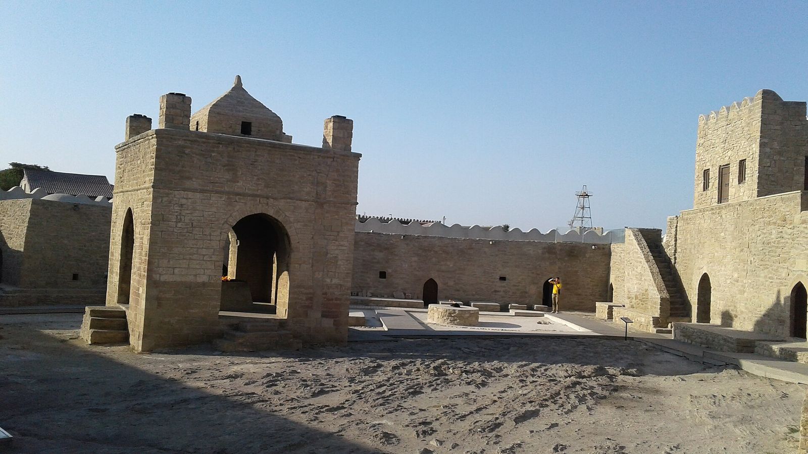 The domed stone fire altar in the walled courtyard of the Ateshgah fire temple at Surakhani, near Baku