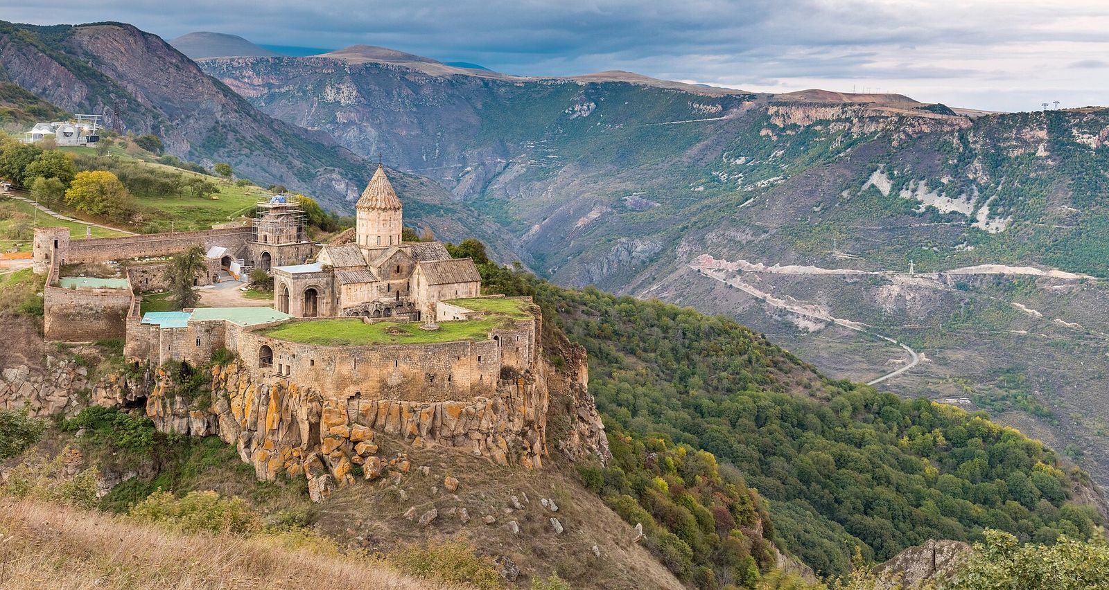 Tatev Monastery on the edge of a cliff above a deep green gorge in southern Armenia