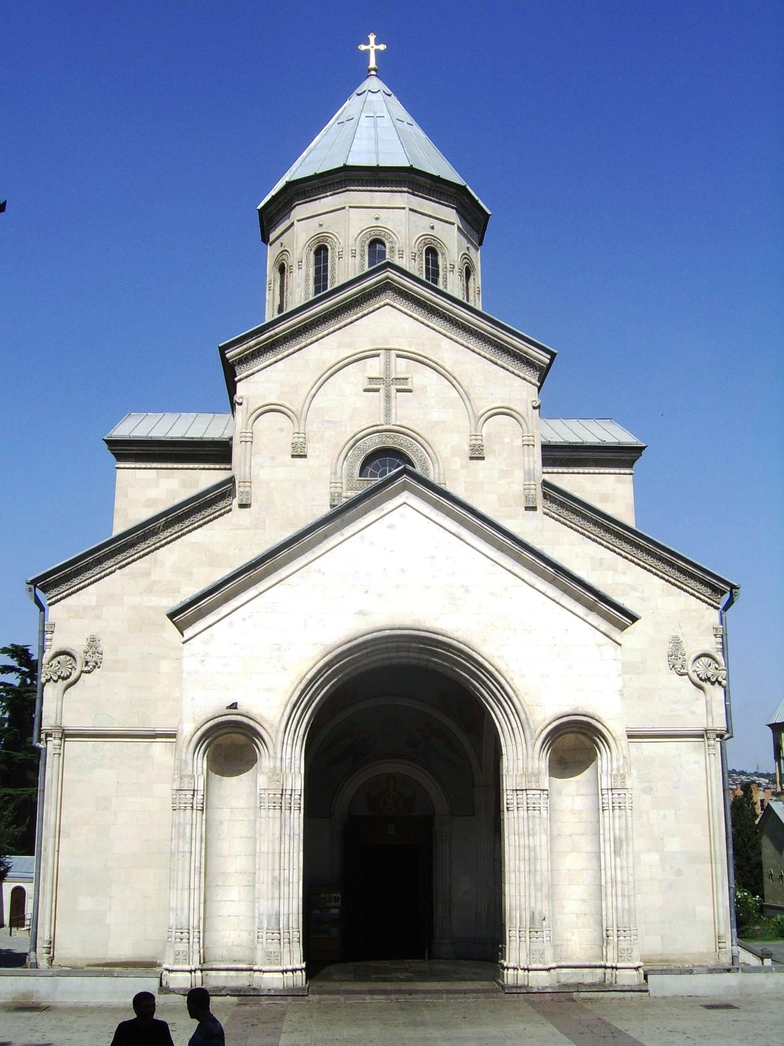 The pale stone front of Kashveti Church on Rustaveli Avenue in Tbilisi, with its arched doorway and conical dome
