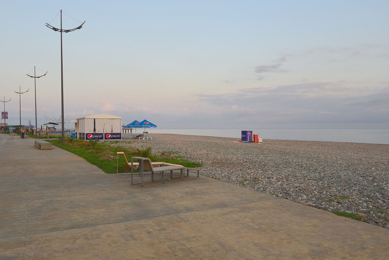 The seafront boulevard and pebble beach in Batumi on the Black Sea