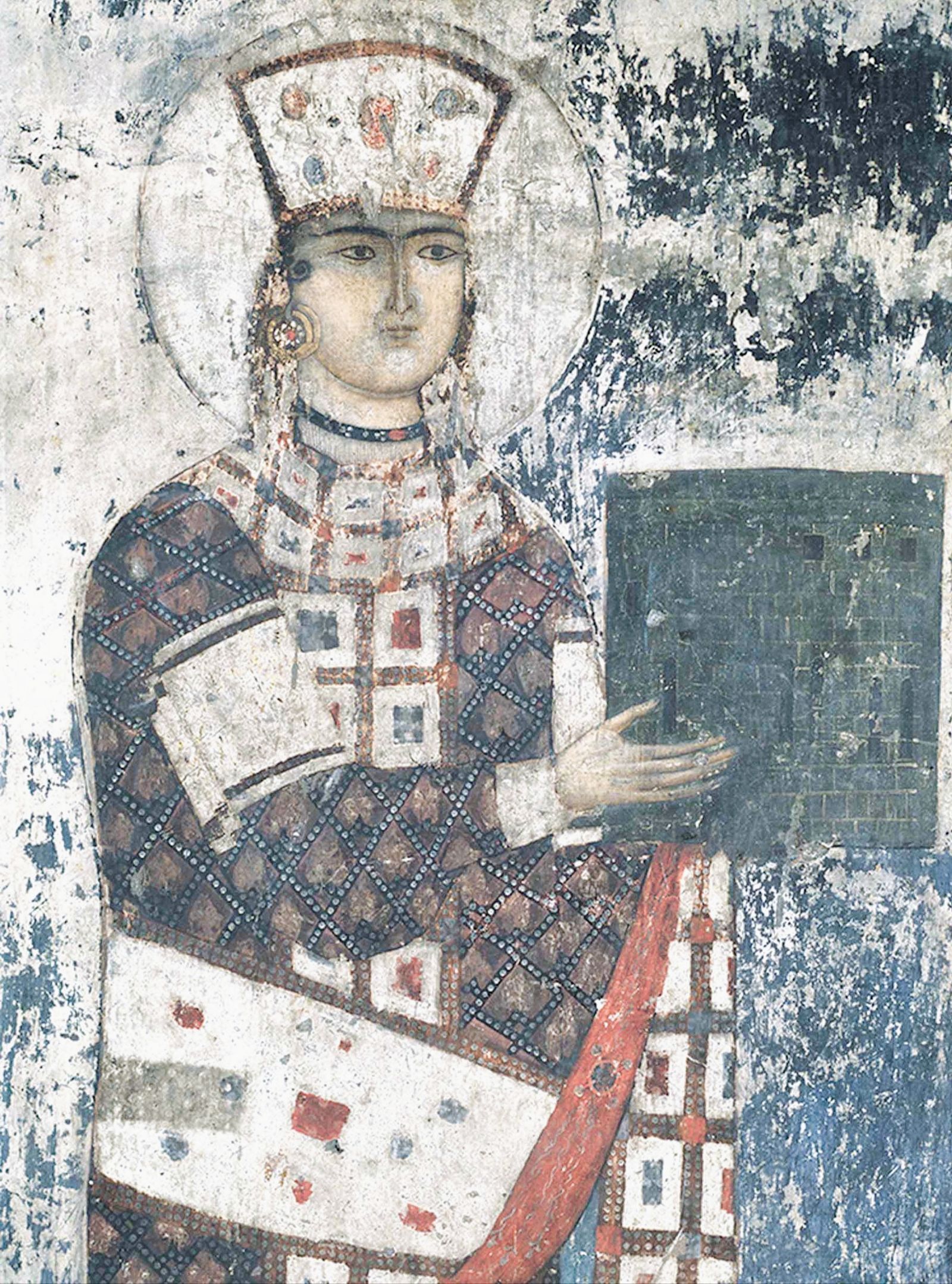 A medieval fresco of Queen Tamar of Georgia in a jeweled crown and robe at the Vardzia cave monastery