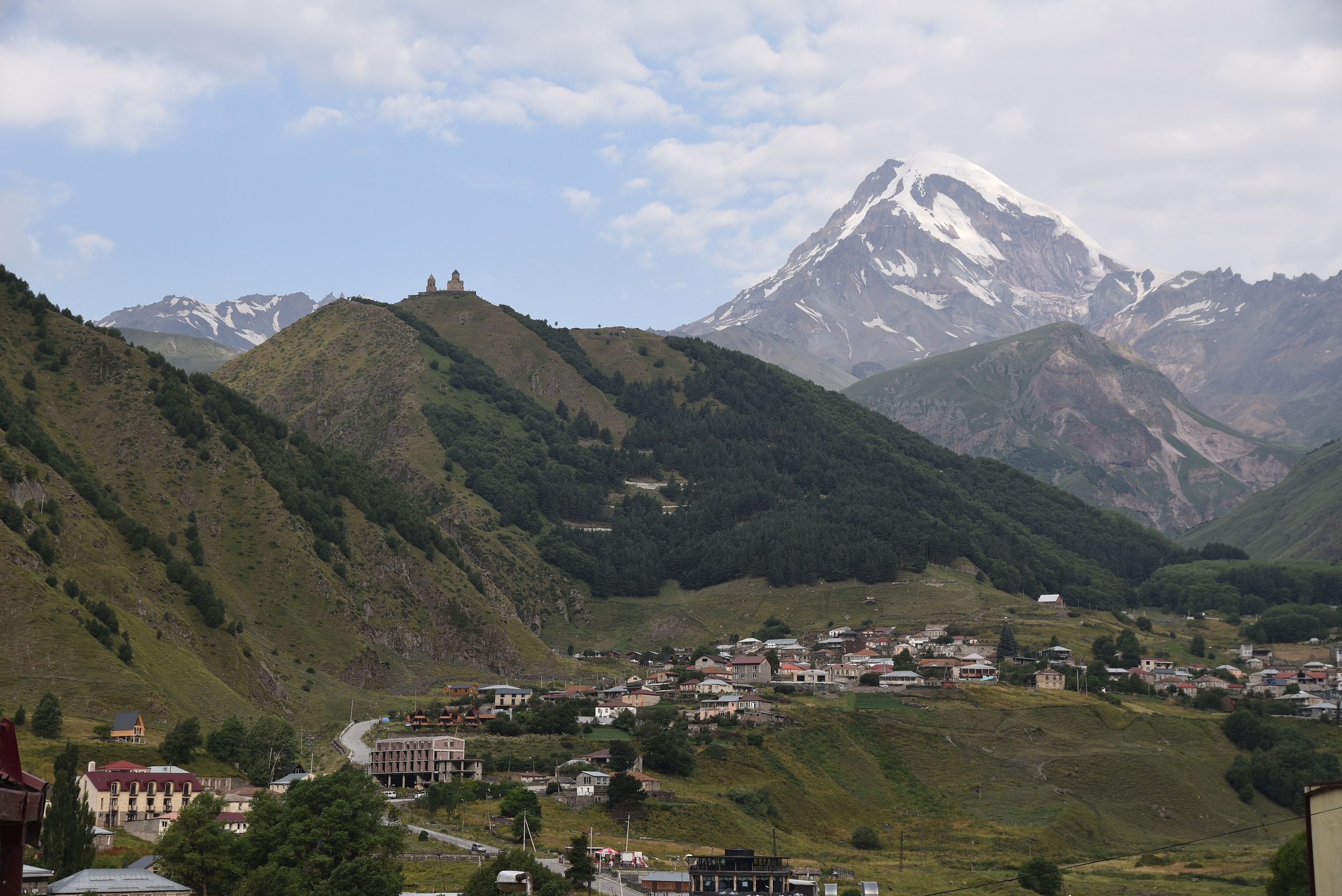 Gergeti Trinity Church on its ridge below Mount Kazbek