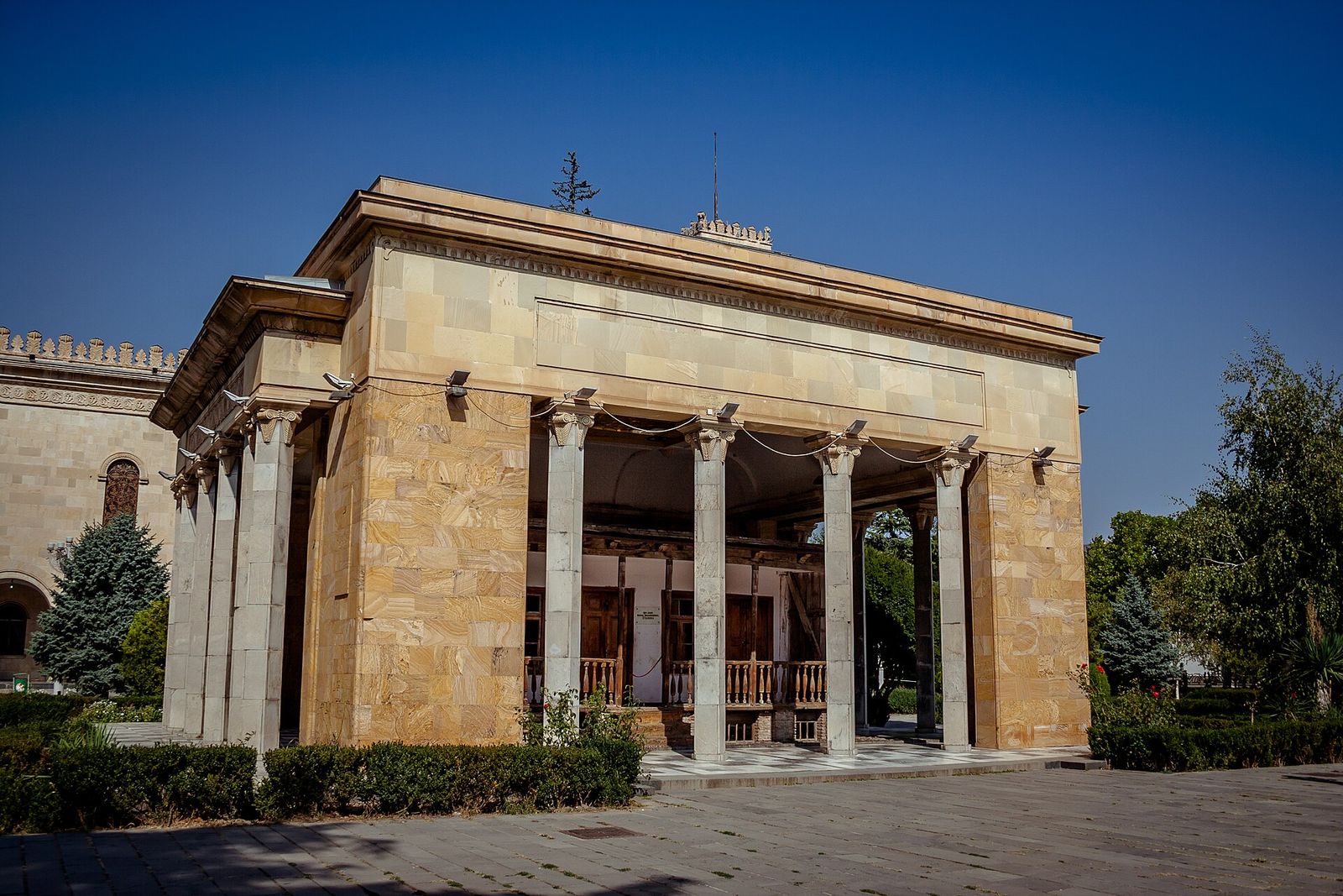 The columned stone pavilion over Stalin's small wooden birth house in the park in front of the Stalin Museum in Gori