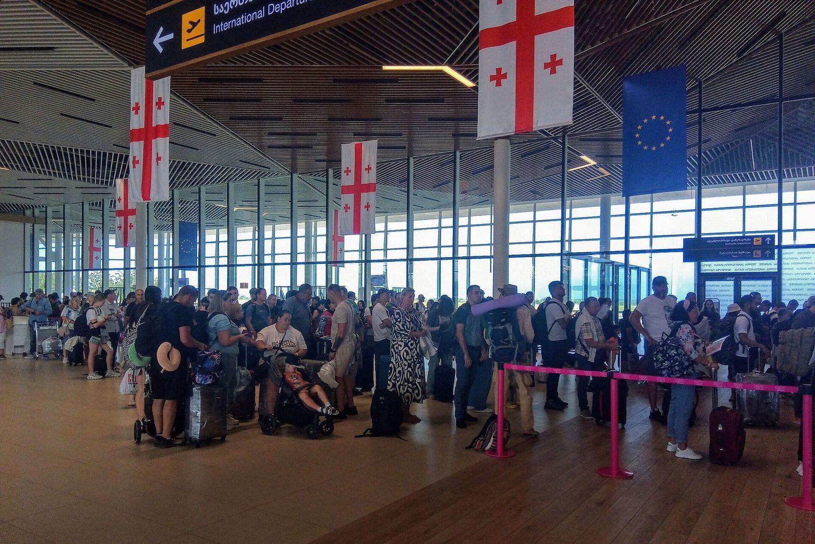 Passengers queuing in the international departures hall at Kutaisi International Airport