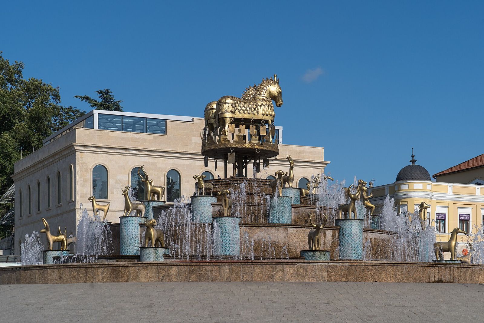 The Colchis Fountain on Kutaisi's main square, with golden horse and animal figures above the jets of water