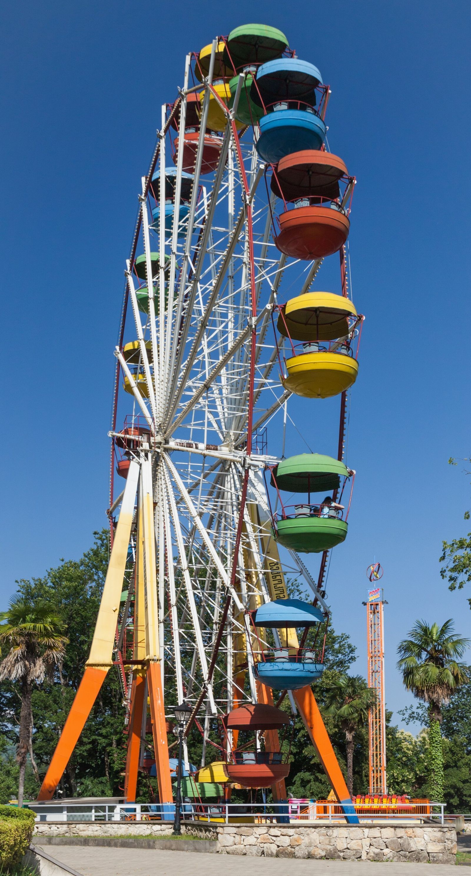 The Ferris wheel with its colored cabins in the amusement park in Besik Gabashvili Park, Kutaisi