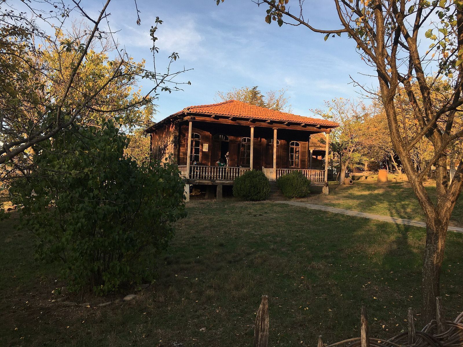A traditional wooden oda house from Guria with a veranda at the Open Air Museum of Ethnography in Tbilisi