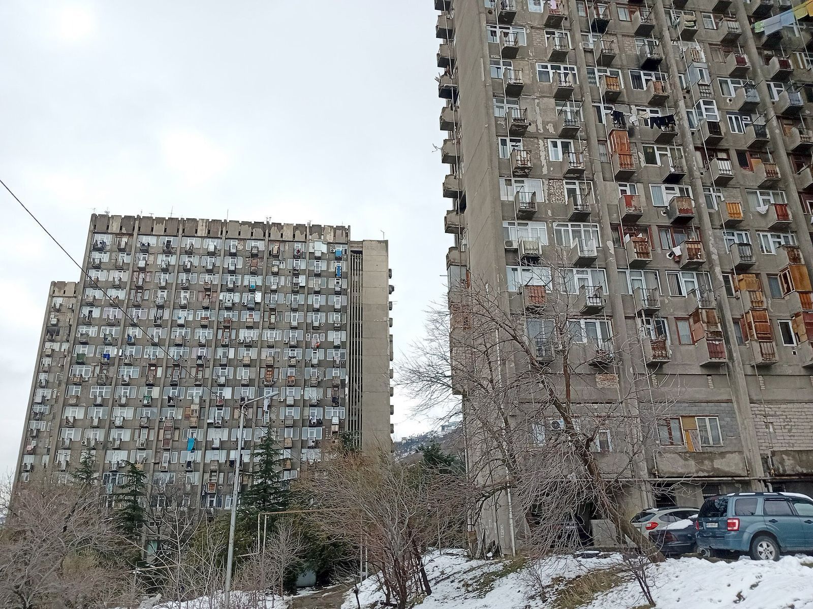 The two former Tbilisi State University dormitory towers in Bagebi, their cube balconies stepping out of the concrete facades