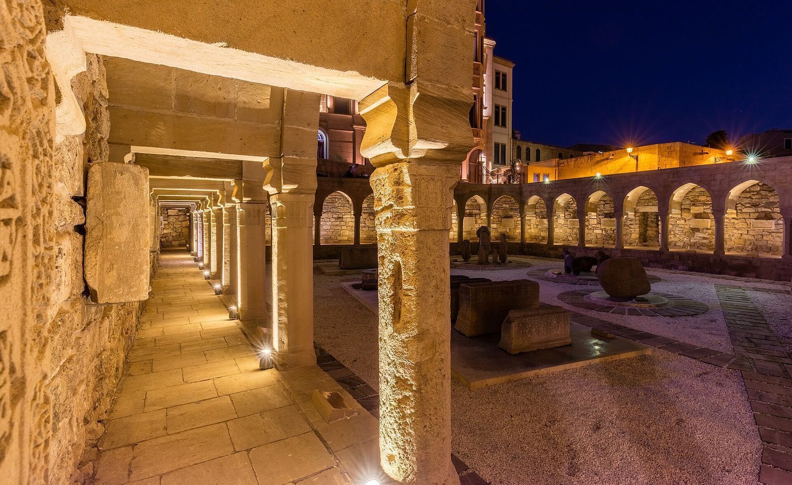 Stone buildings and a monument in the historic center of Baku