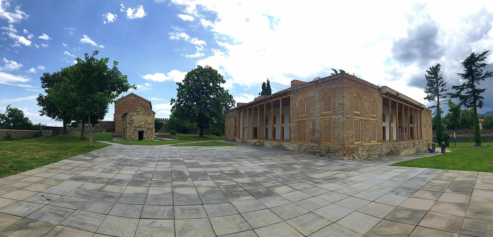 The arcaded brick palace of King Erekle II and the small royal church inside the Batonis Tsikhe fortress in Telavi