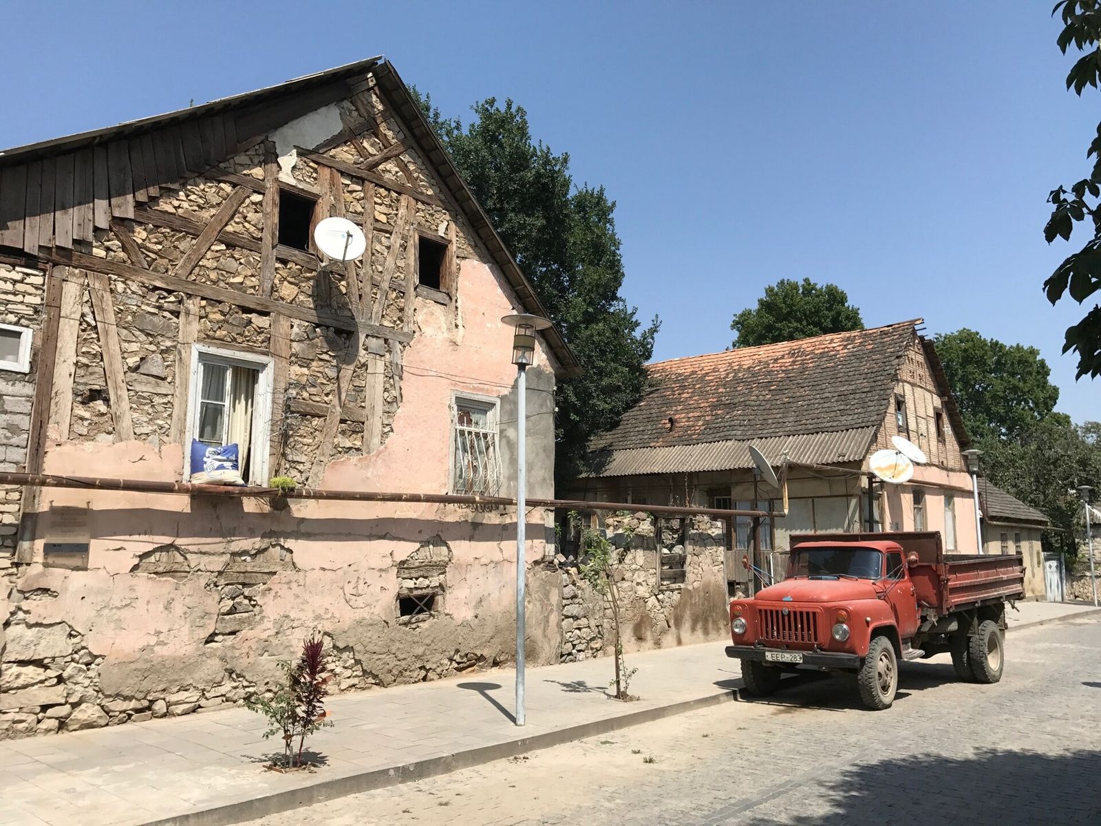 Half-timbered German houses on a cobbled street in the old German Quarter of Bolnisi