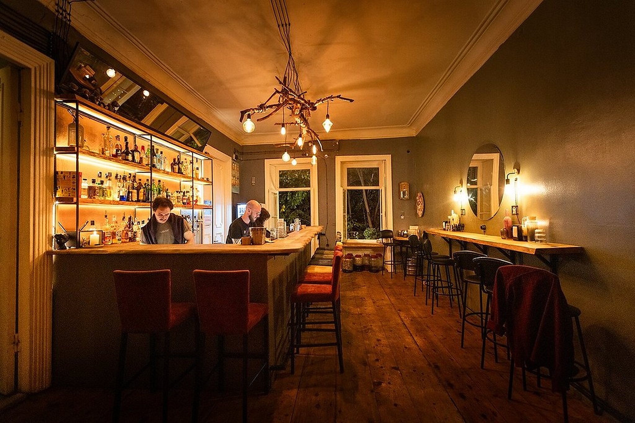 Wine bar with bottles behind the counter